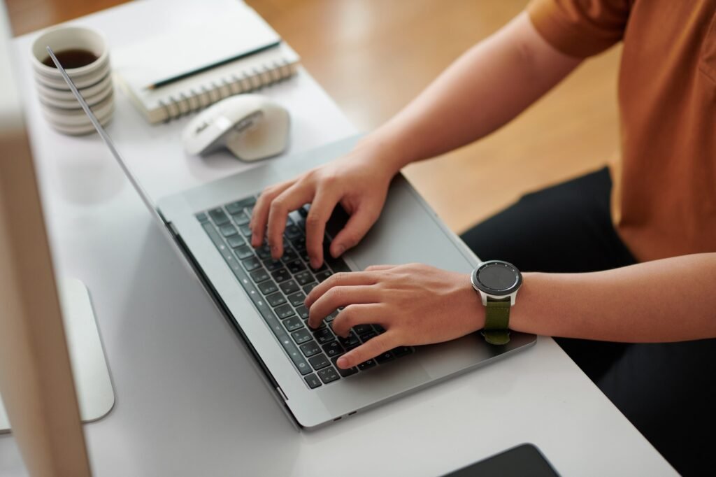 Devops Engineer Working on Laptop